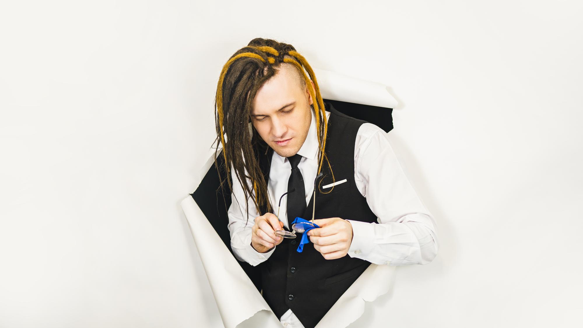 Instructor arranging threads in natural light