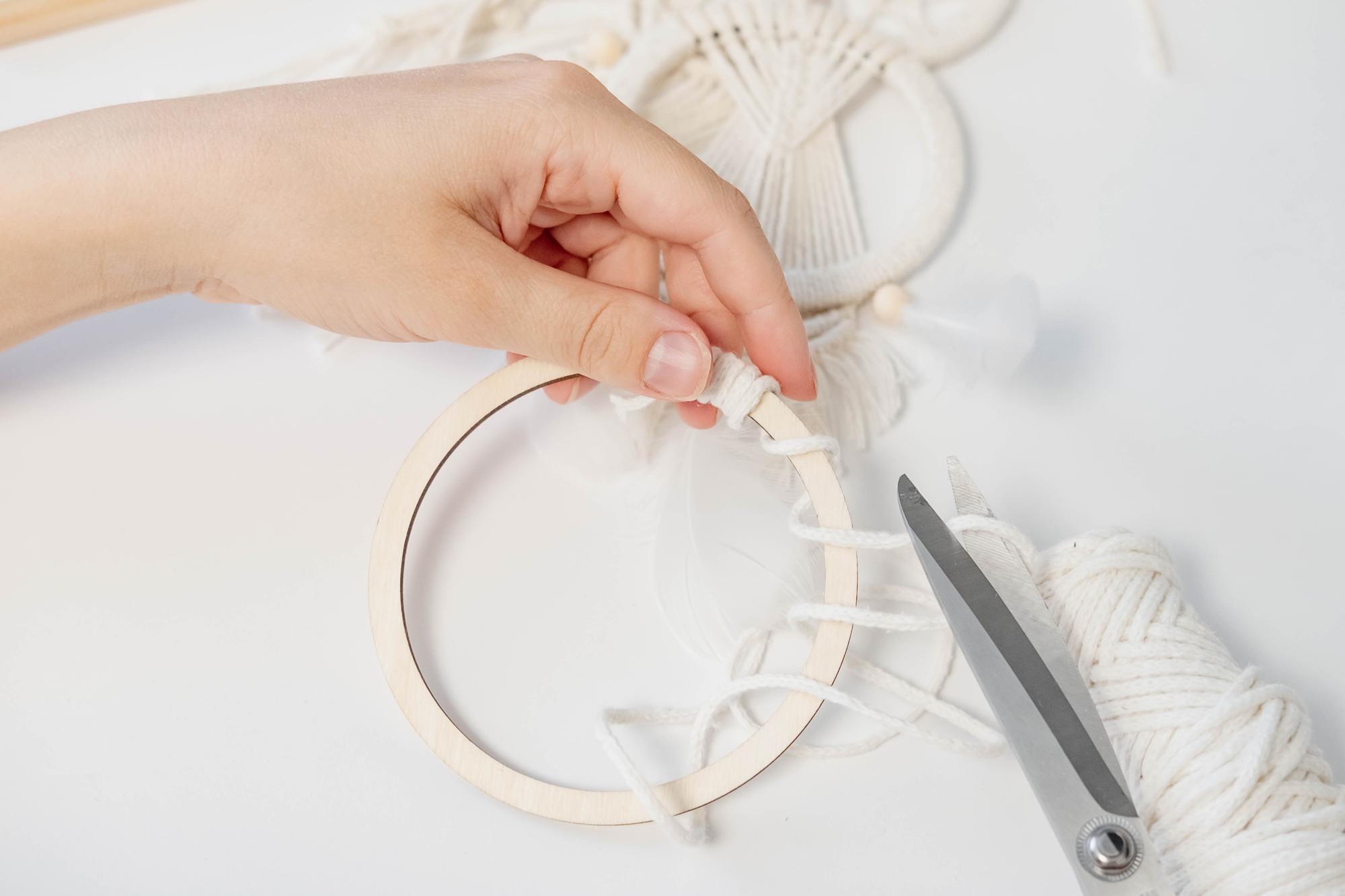 Studio with embroidery hoop and threads on table